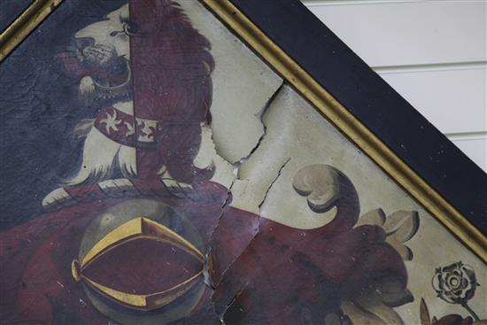 An early 19th century hatchment, oil on canvas, decorated with the arms of Lt. Gen. Sir Herbert Taylor, GCB, GCH, diagonally 70 x 70in.